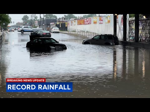 RECORD RAINFALL: Chicago River floods onto Riverwalk